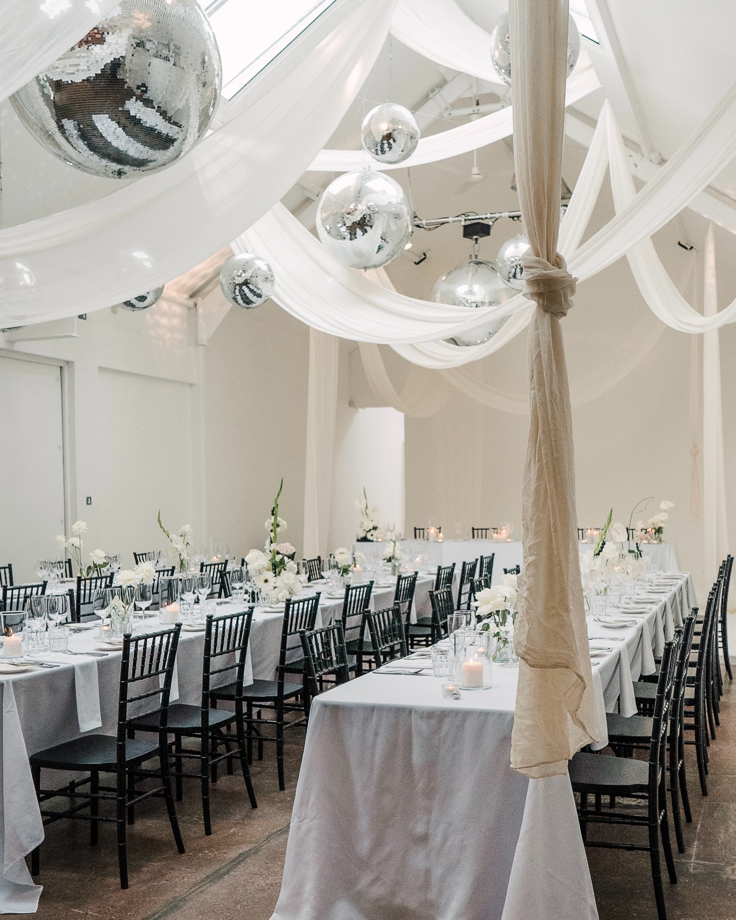 Wed in style 💍…

A minimalist white wedding for the Stacey & Alex, with fabric installations & mirror balls to complement the blank-canvas studio spaces - captured beautifully by @ayeshaphoto 

planning / coordination @vronikatinkle 
fabric installations @miasylviaa 
mirror balls @hipswinguk 
florals @thebudandpot 
celebrant @naomithecelebrant.uk 
stationary @betsy.designs 
cake @thepalmsbakery 
dress @dottybridal 

#fivefourstudios